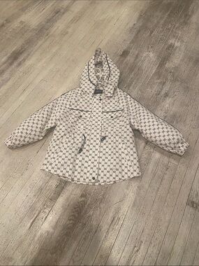 Women's White Hooded Raincoat with Allover Navy Motif. size M